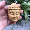 Buddha and Demon Duality Thuja Wood Carved Pendant