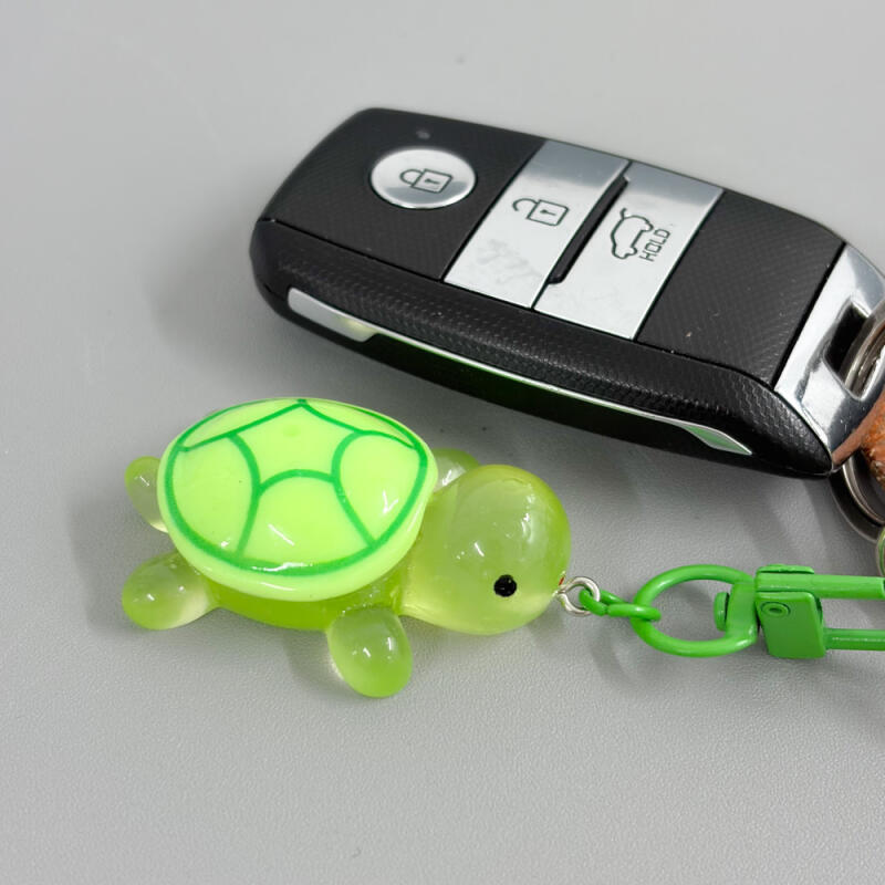 Glow-in-the-dark turtle lucky keychain mini boogie bag chaki keychain