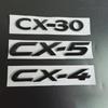 Mazda CX-30, CX-4, and CX-5 Glossy Black Badges: Numerical, Trunk Letter, and Tail Displacement Badges.