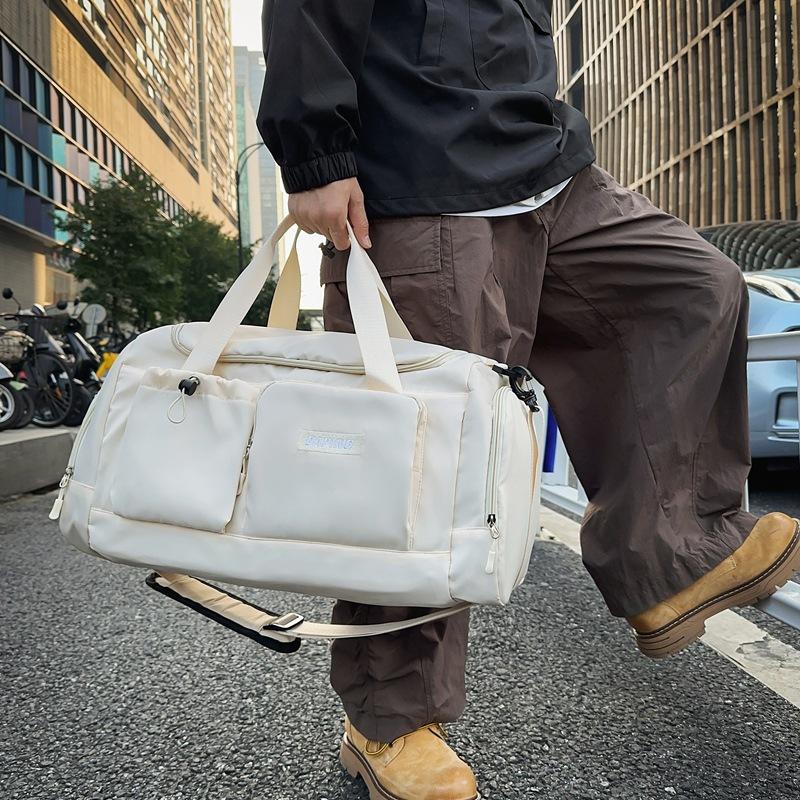 Men's and women's simple sports outdoor fitness treasure hand luggage bag going out to play large capacity multi-pocket travel bag