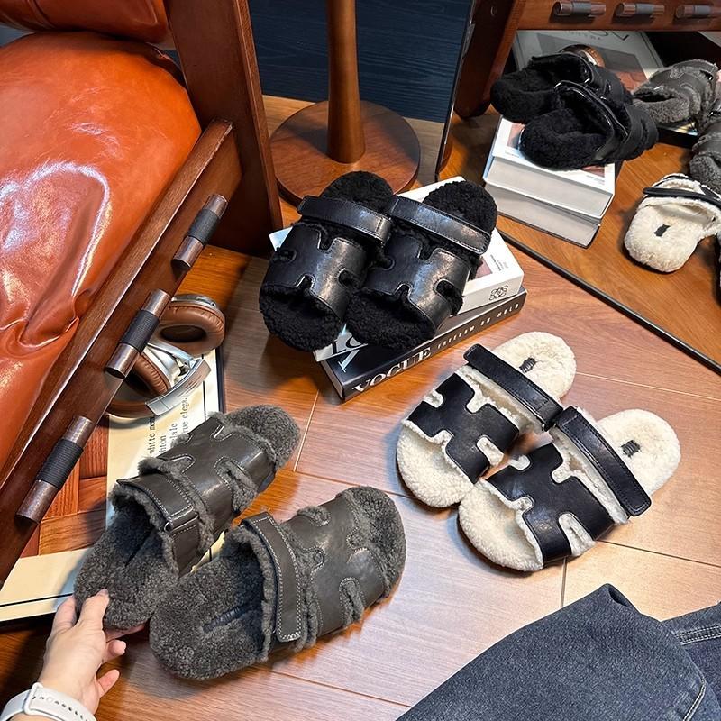 Европейские товары 2025 осень и зима новые кожаные на толстой подошве тапочки из овечьей шерсти женские носят знаменитости интернета на плоской подошве ленивые шерстяные тапочки