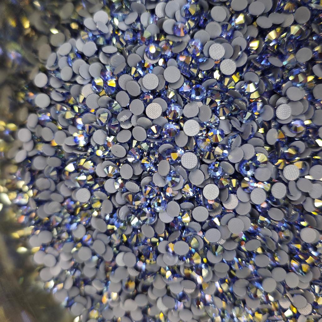 Zk Eco-Friendly High-quality Light Sapphire Color Gold-plated Hot Fix Glass Rhinestones 12 Facets Flat Back Clothing Accessories