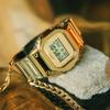 Casio Цифровые часы Унисекс с кварцевым механизмом, водонепроницаемые до 200 м, силиконовый ремешок, золотой циферблат GM-5600YMG-9