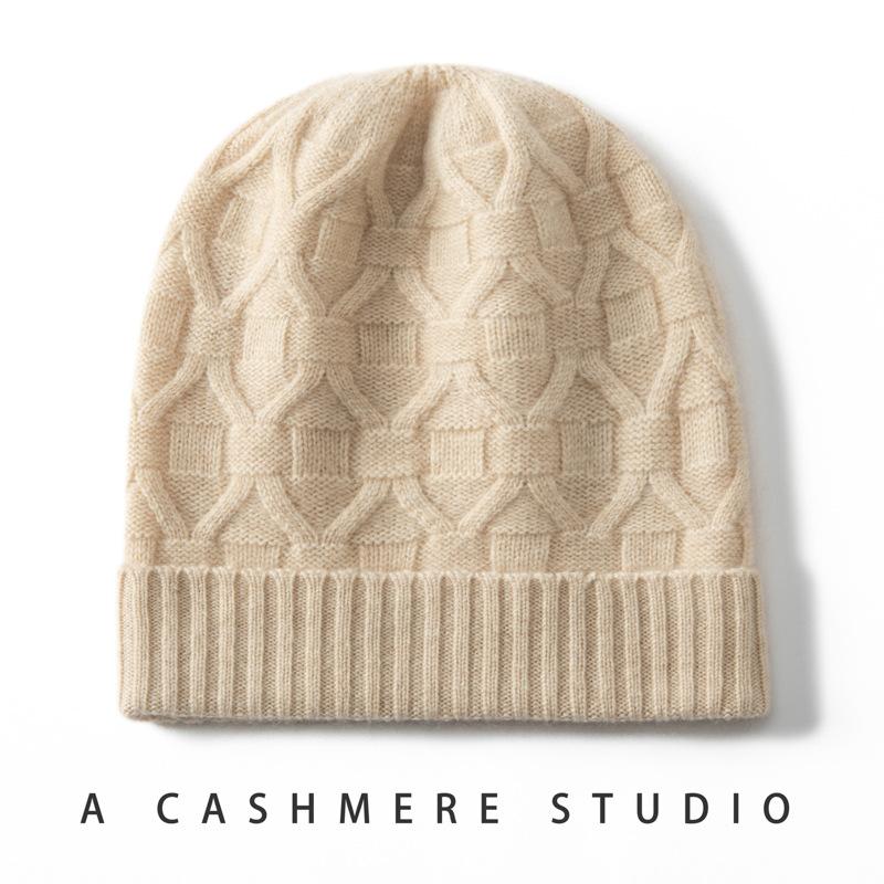 Autumn and winter new first-line cashmere women's solid color twisted flower warm fashion ear protection knitted casual flanged hat