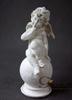 Angel sitting on a white ball 18x7 cm