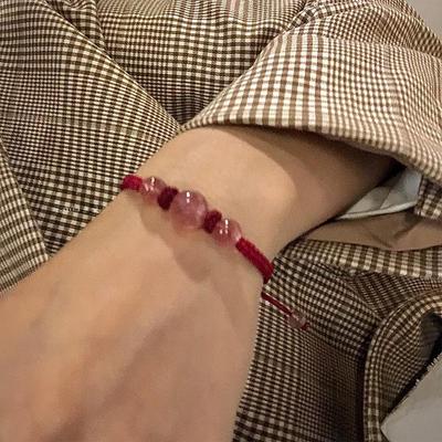 Парные плетеные браслеты из обсидиана с персиковым цветком и клубничным кристаллом