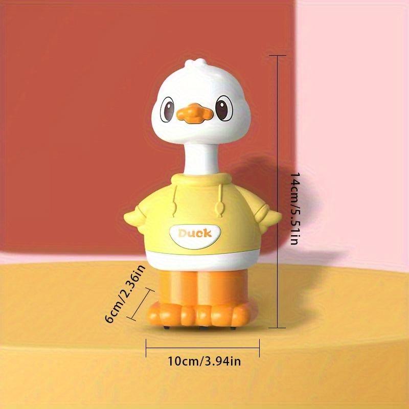 A Cartoon-shaped Sliding Toy, a Little Yellow Duck, That Bounces Back When the Youngsters Pushes It.