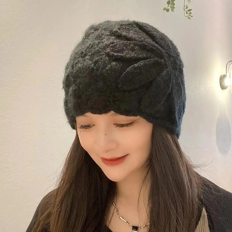 Autumn and winter fashion hollow knitted wool hat women's ear protection simple fashion big head circumference cold hat flower pullover hat