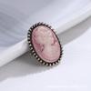 Elegant Resin Alloy Brooch: Retro Relief Art Jewelry for European & American Fashion