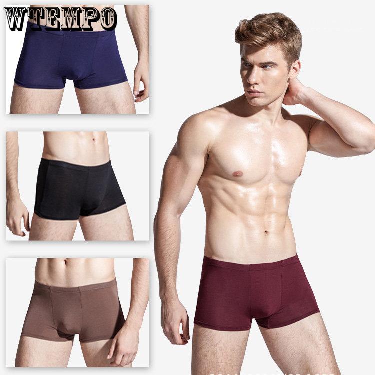 Мужские спортивные трусы-боксеры из 4 предметов. Удобные и дышащие трусы-боксеры большого размера с принтом.