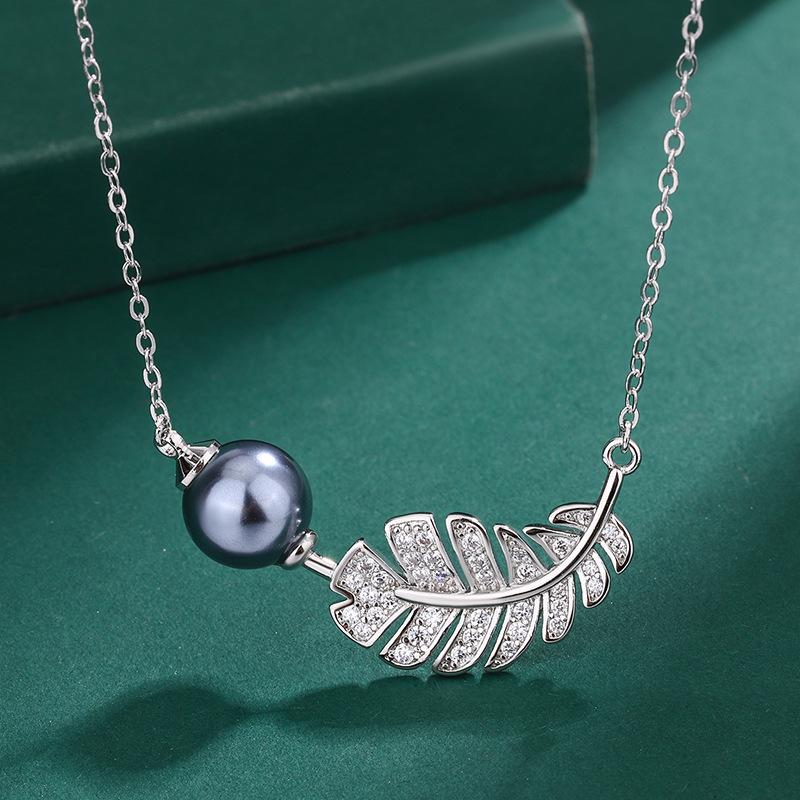 Imitation natural freshwater pearl feather ring European and American S111 silver needle earrings zircon Tahiti necklace women's