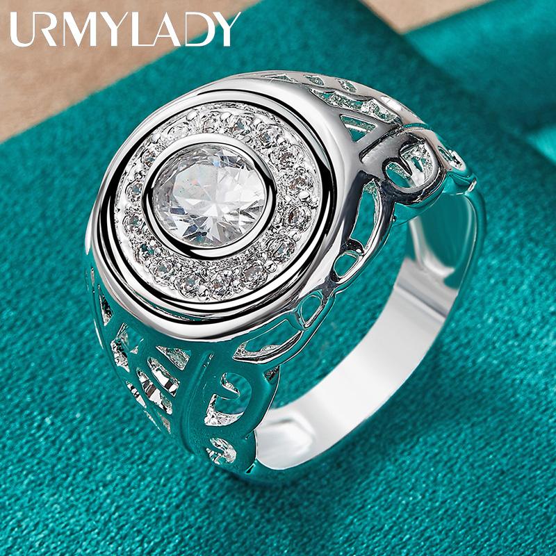 Серебряное кольцо в форме часов с фианитами