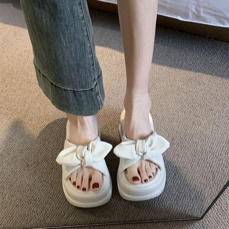 Тапочки женские tide ins популярные летние 2025 новые универсальные увеличивающие толстое дно бант повседневные крутые тапочки tide