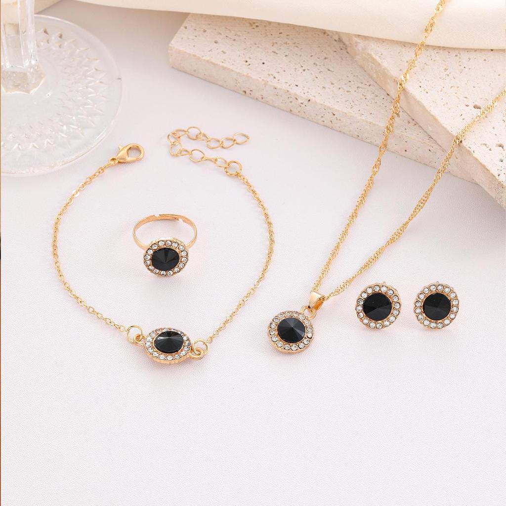 Elegant Jewelry Set: Diamond Earrings, Necklace, Bracelet, Ring, and Watch