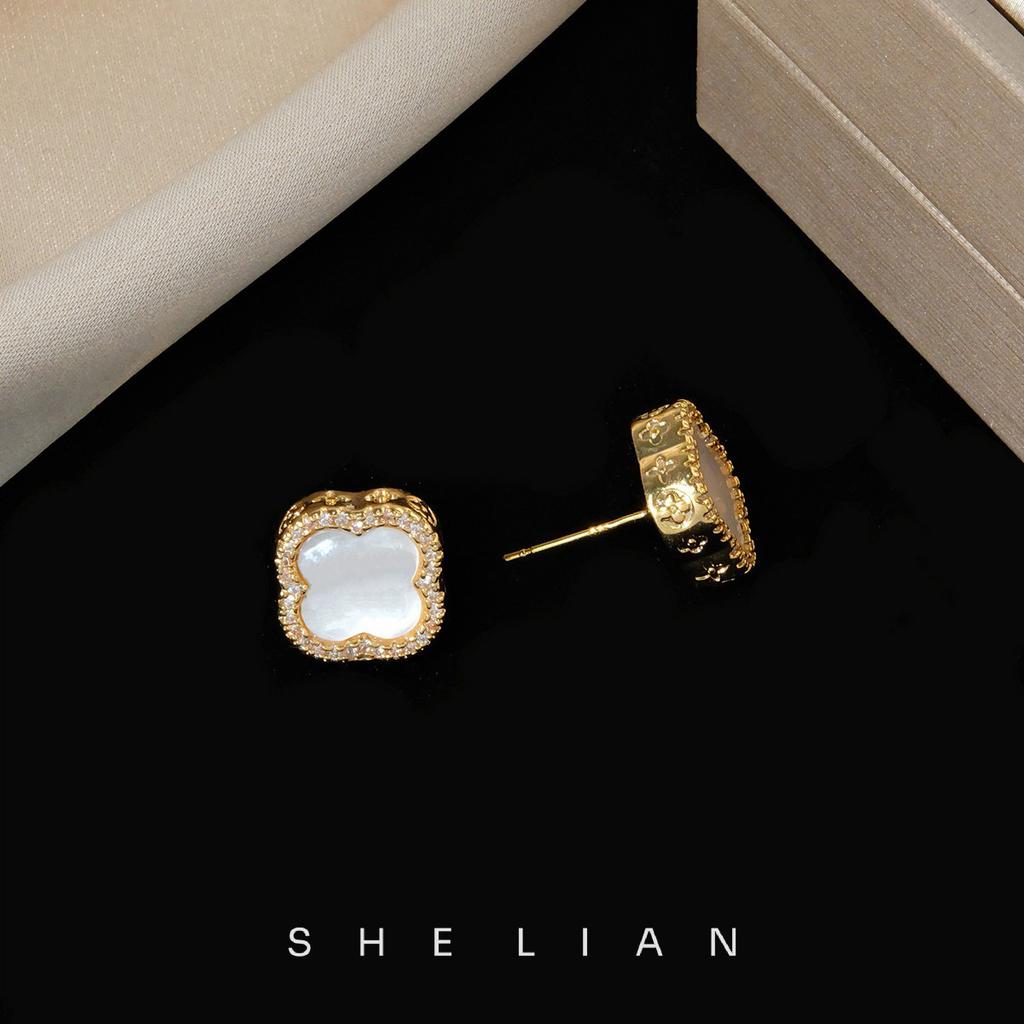 Korean version ins fashion fritillary four-leaf flower stud earrings women's light luxury zircon rimmed earrings temperament versatile personality