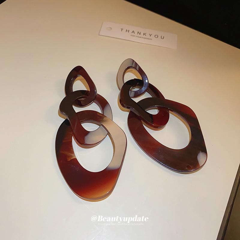 Серебряные серьги-цепочки с иглами из смолы и нестандартной формы — смелый европейский и американский модный дизайн.