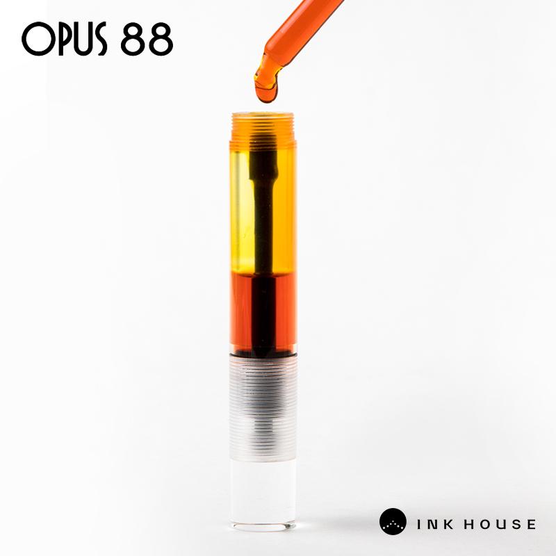 OPUS 88 DEMO Перьевая ручка Прозрачный демонстратор Оранжевое перо JOWO Система заполнения пипеткой Большой объем чернил