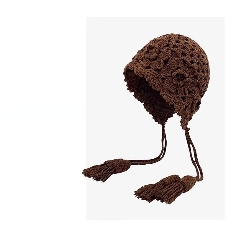 Hand-crocheted flower fringed wool hat women's autumn and winter western Sichuan travel versatile fashion show face small knitted headgear