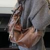Commuting large-capacity soft leather dumpling bag women's winter new fashionable high-value messenger bag women