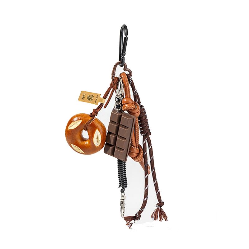 Yogodlns Подвеска в виде рогалика с щелочной водой, симпатичное улыбающееся лицо, плетеная веревочная сумка, аксессуар ручной работы, модный подарок