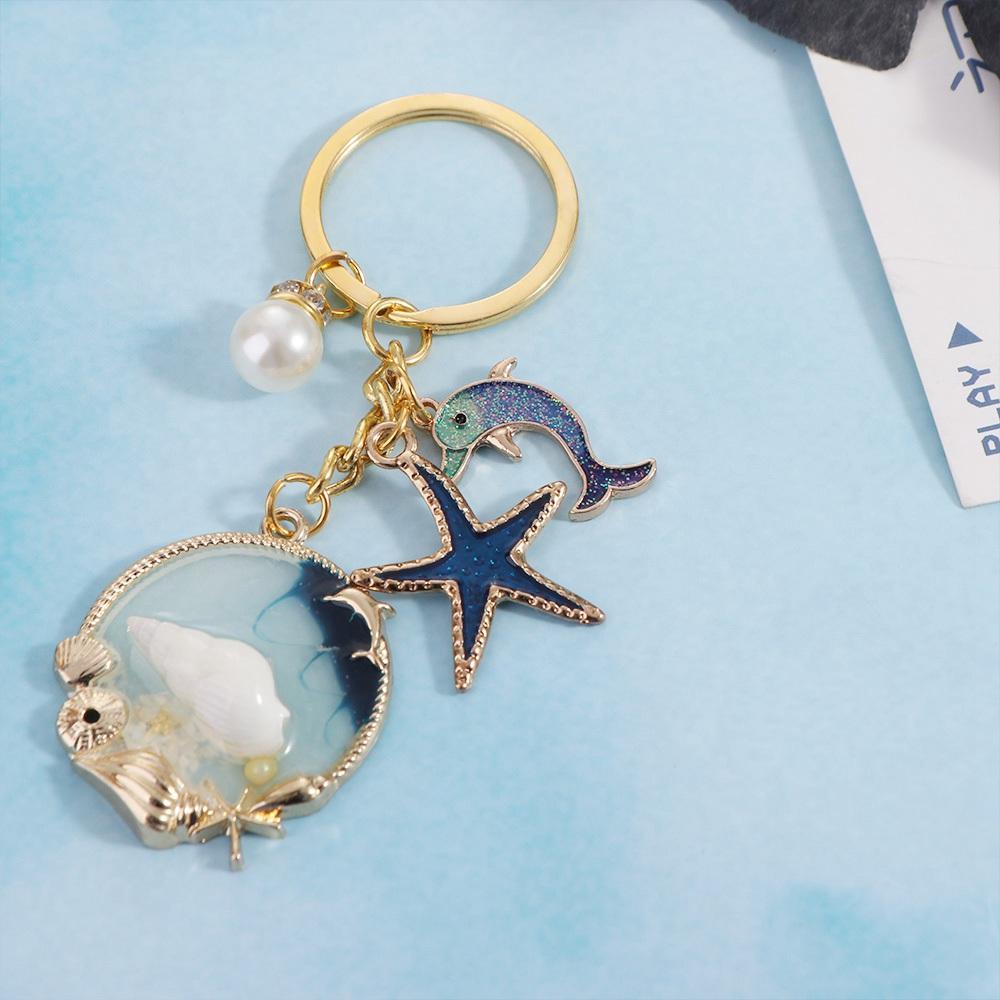 Брелок с жемчугом и дельфином, модные подвески на морском пляже, новый брелок с ракушкой и звездой унисекс