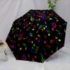Folding umbrella Colorful musical notes pattern, black background. Creative portable folding umbrella Christmas and other holi