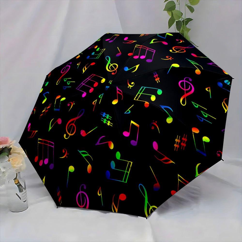 Folding umbrella Colorful musical notes pattern, black background. Creative portable folding umbrella Christmas and other holi