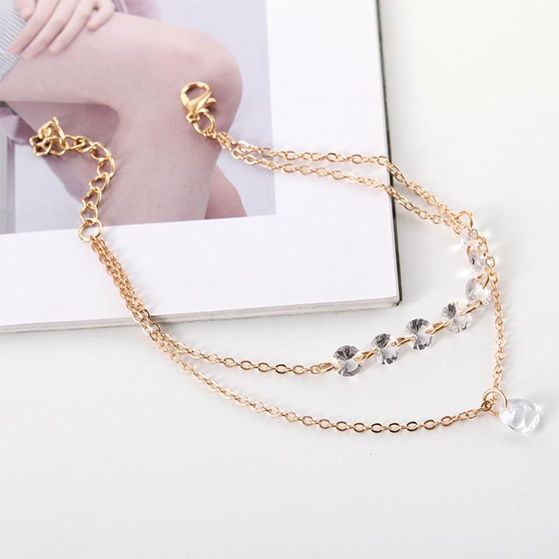 Элегантный женский браслет из сплава и горного хрусталя