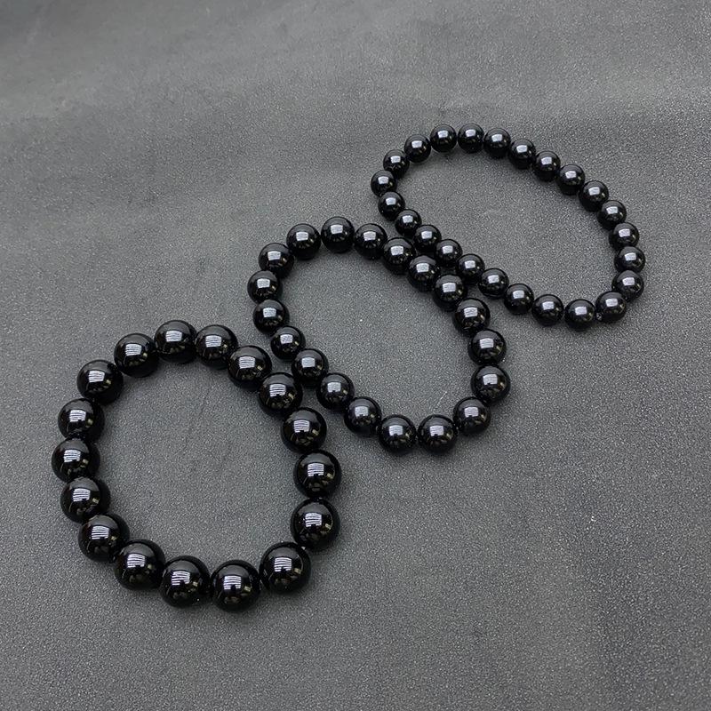 Браслет из натурального тектитового стекла-метеорита с круглыми черными бусинами