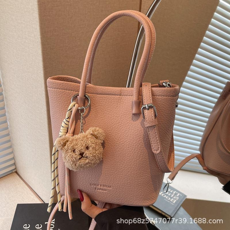 Korean Version of Retro Bucket Bag Women's 2025 New Fashion Lychee Pattern Vegetable Basket Bag Niche Commuter Shoulder Messenger Bag