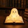 Ghost Figurine Desk Lamp Magic Book Night Light, Resin Tabletop Warm Glow with Moon Cute Light Star Relief, Bedside Sleeping for Kids Bedroom,