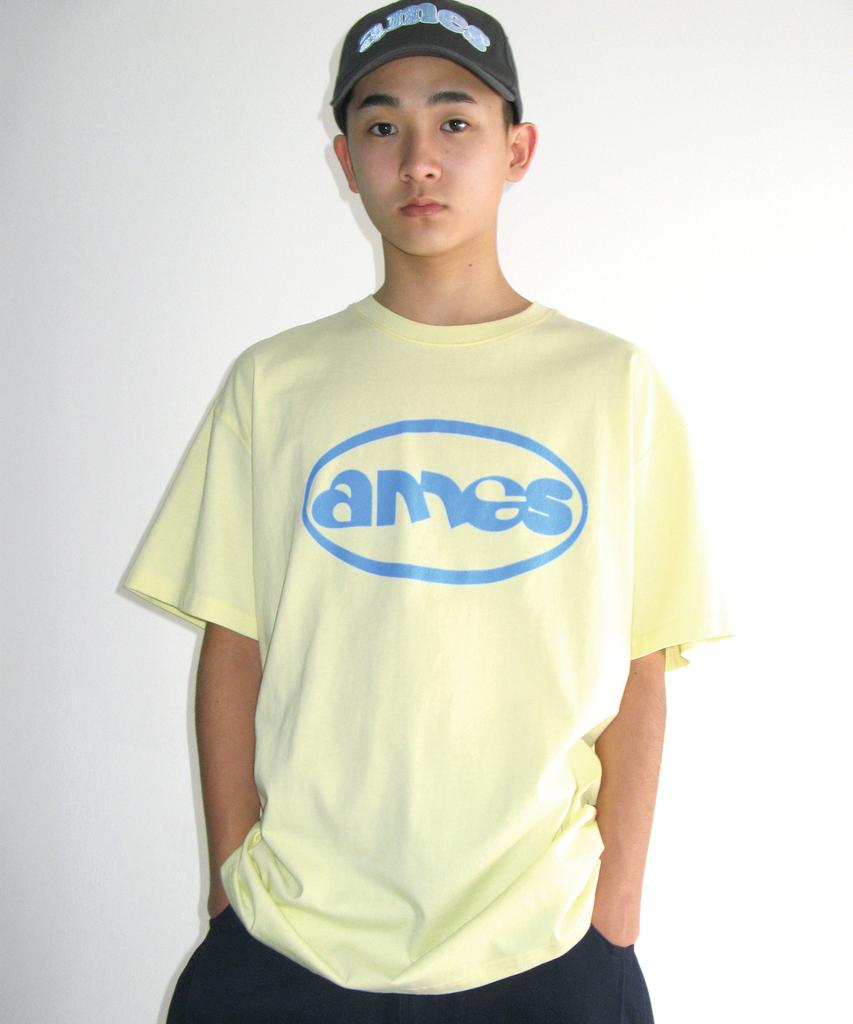 AMES-WORLDWIDE Ames Circle Logo Symbol Tee Yellow