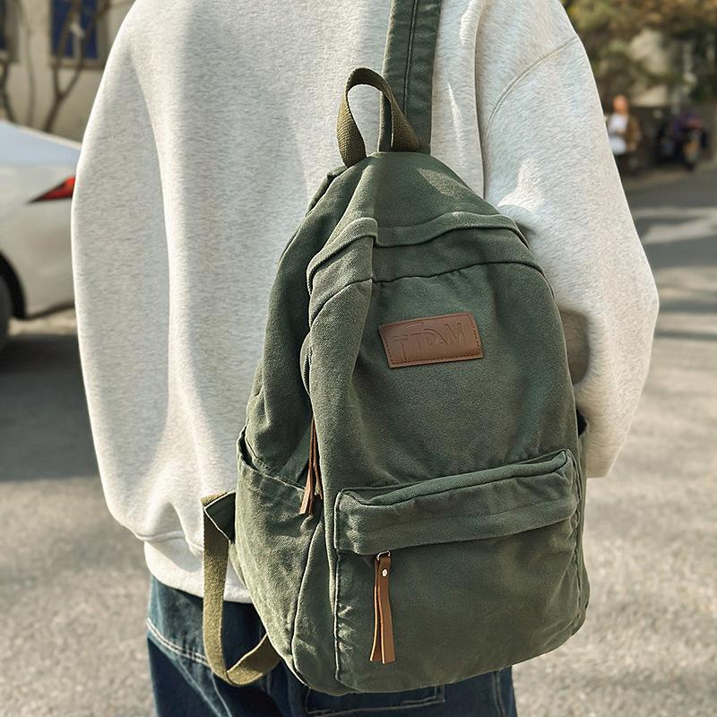 New denim canvas labeled fashionable four-season backpack Japanese and Korean casual large-capacity backpack