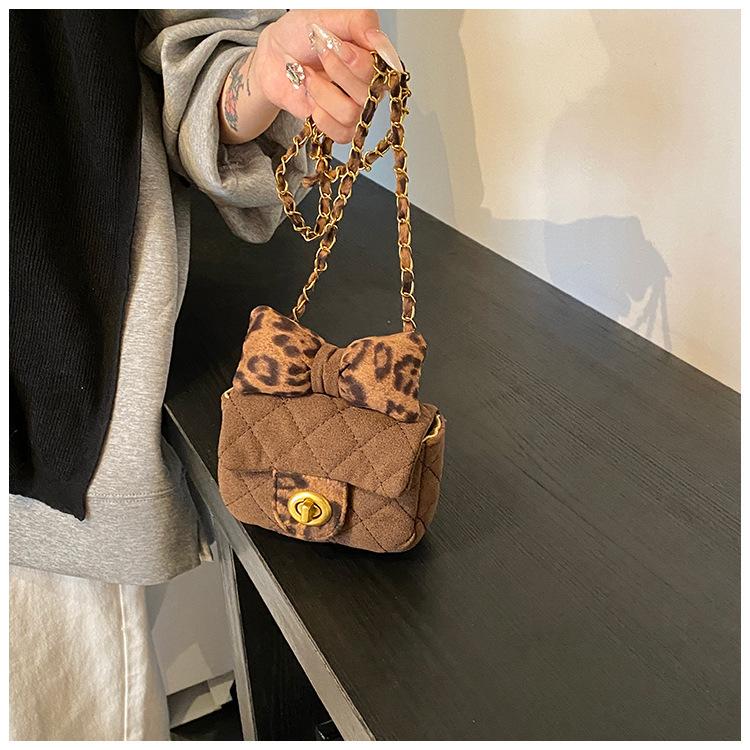 Новая женская сумка с ромбовидным бантом.