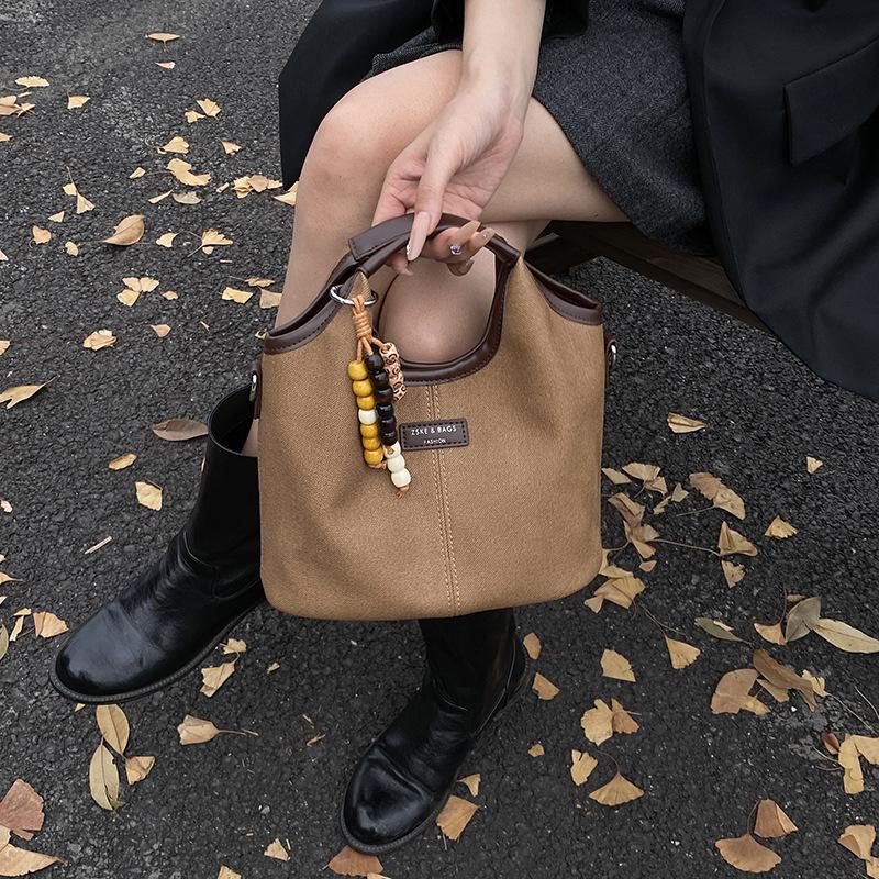 Премиальная женская сумка 2025 новая модная дорожная сумка на плечо, повседневная универсальная сумка-мессенджер, сумка-ведро