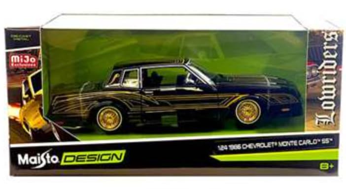 Модель автомобиля Chevrolet Monte Carlo Lowrider в масштабе 1:24 от Maisto, 1986 г., Черный/Золотой, 1986 г.