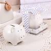 Ceramic Piggy Bank In the Shape of a White Pig