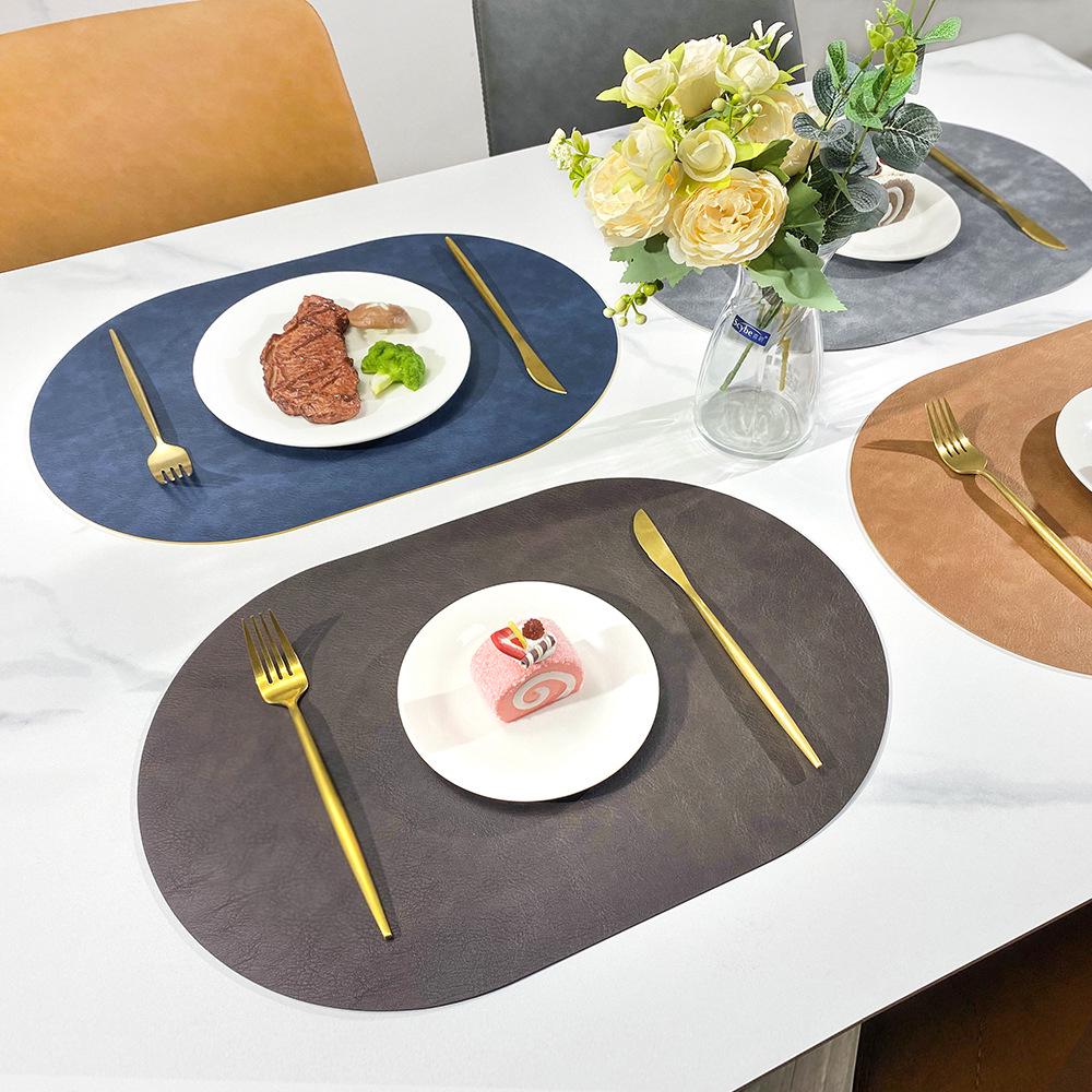 Двусторонний коврик под приборы из коровьей кожи в скандинавском стиле - водонепроницаемый и маслостойкий овальный изоляционный коврик