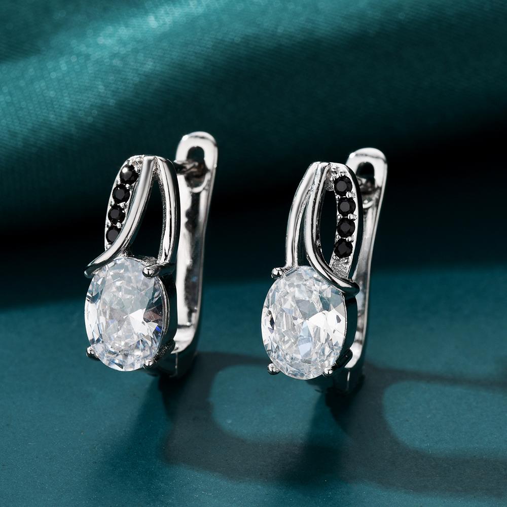 Серьги-кольца с овальными прозрачными цирконами и черными акцентными камнями, блестящая зеркальная отделка, гипоаллергенные украшения для женщин