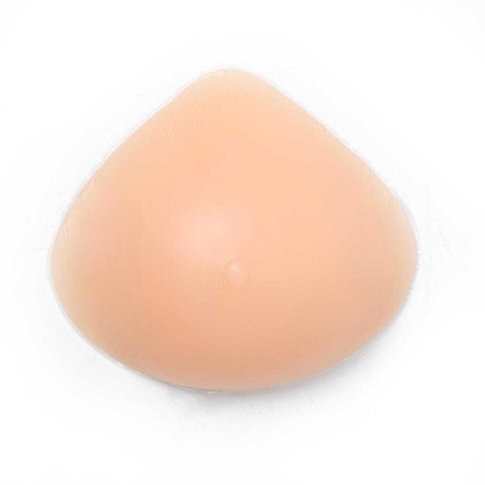 Треугольный силиконовый протез груди в тон кожи - послеоперационная вогнутая накладка на грудь