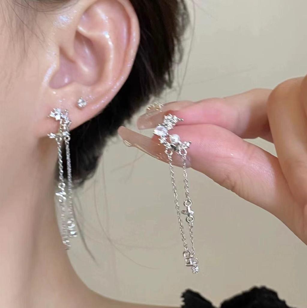 Серьги-бабочки с цирконом: Роскошь, универсальность, тренд сезона осень/зима