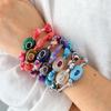 Акцентный браслет-амулет с плетеным глазом и деталью из натурального камня, 22 см. Украшение для повседневной носки и для создания многослойных образов.