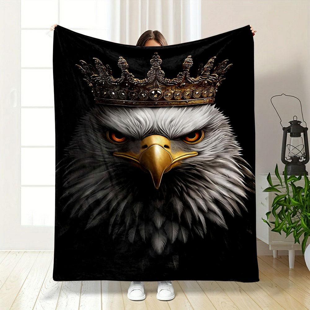 A regal eagle with detailed feathers wearing an ornate golden crown. for all seasons blanket lunch break throw gift
