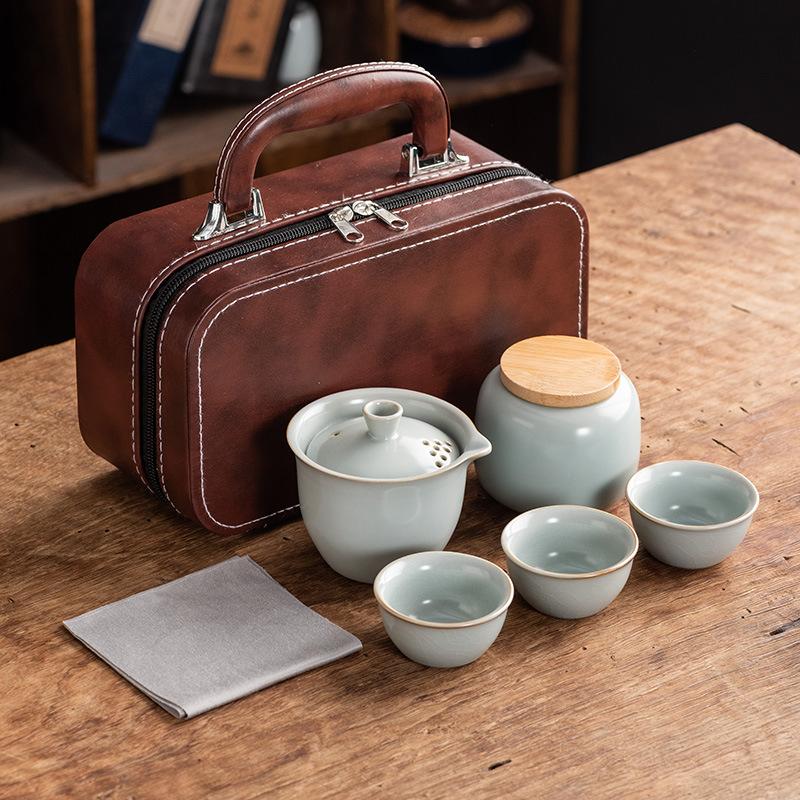 Celadon Ge Kiln Opening Film Can Raise Outdoor Portable Travel Tea Set, One Pot of Three Cups of Kuaike Tea Cup Gifts