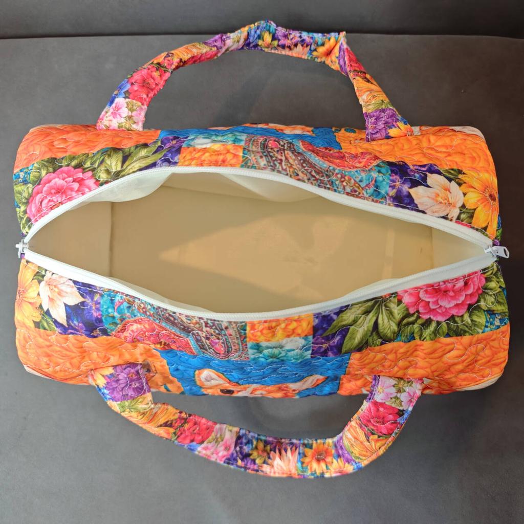 Quilted travel handbag Provence floral print weekend bag Bohemian leisure travel fitness bag vibrant red background lavender and sunflower graphic