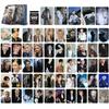 Набор из 55 коллекционных фотокарточек с различными участниками мужских групп в множестве поз и нарядов для коллекции и демонстрации фанатами