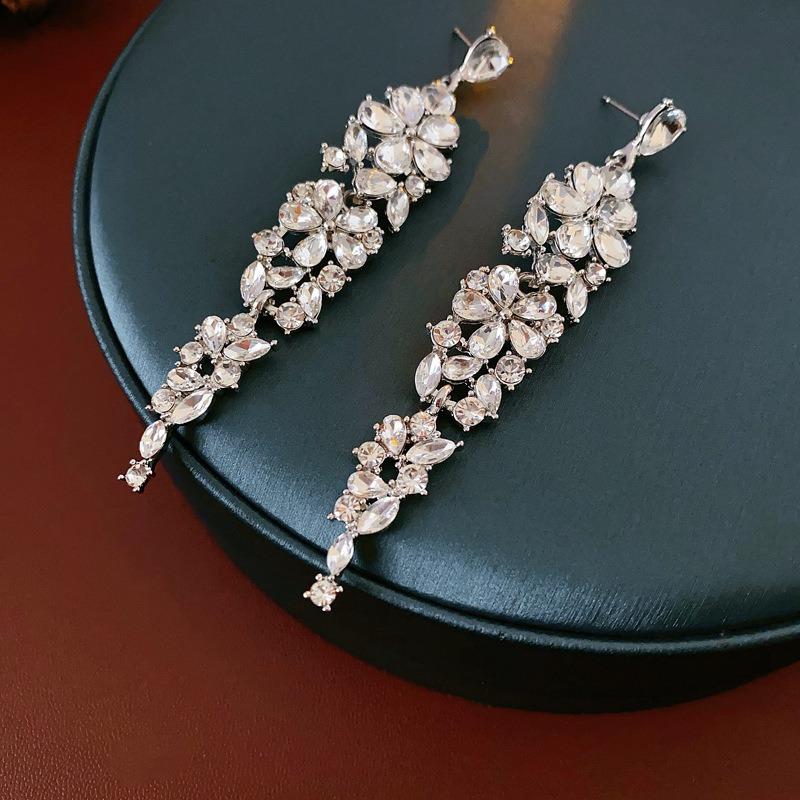 Серьги-подвески с серебряной иглой, бриллиантовым цветком, каплей воды и кисточкой, преувеличенные серьги, легкая роскошь, премиальные серьги для женщин