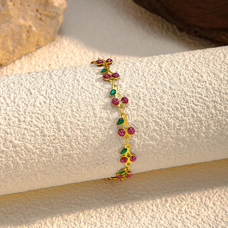 Fashion creative color drip cherry bracelet women's best-selling stainless steel hand jewelry light luxury personalized bracelet
