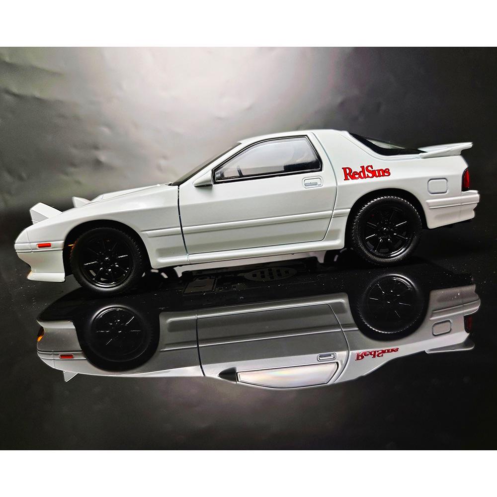 Игрушечная легкосплавная машинка Mazda RX-7 1/24 со звуком, светом и рулевым управлением — детская модель в подарок.