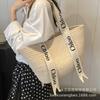 Woven straw bag women's large capacity 2025 new versatile seaside shoulder bag beach vacation commuter tote bag